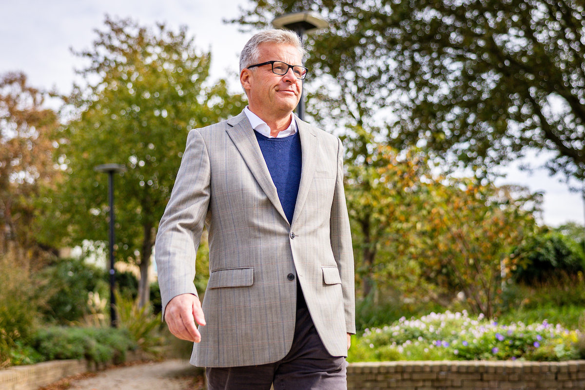 image of wally walking in a park